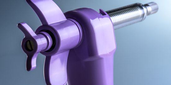 Picture of S5M injection system with blue gradient background